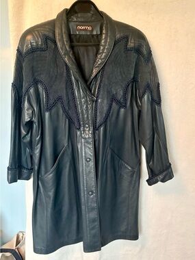 Women's Vintage Leather Coat with Decorative Stitching.